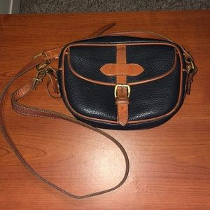 Dooney and Burke crossbody bag. Color dark navy.